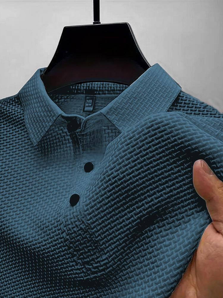 Everyday Polo in denim blue, close-up of the knit