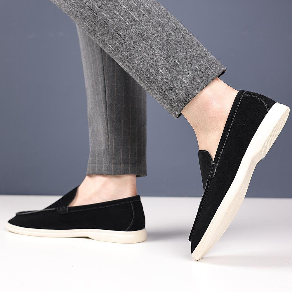 Suede-look loafer in black, worn